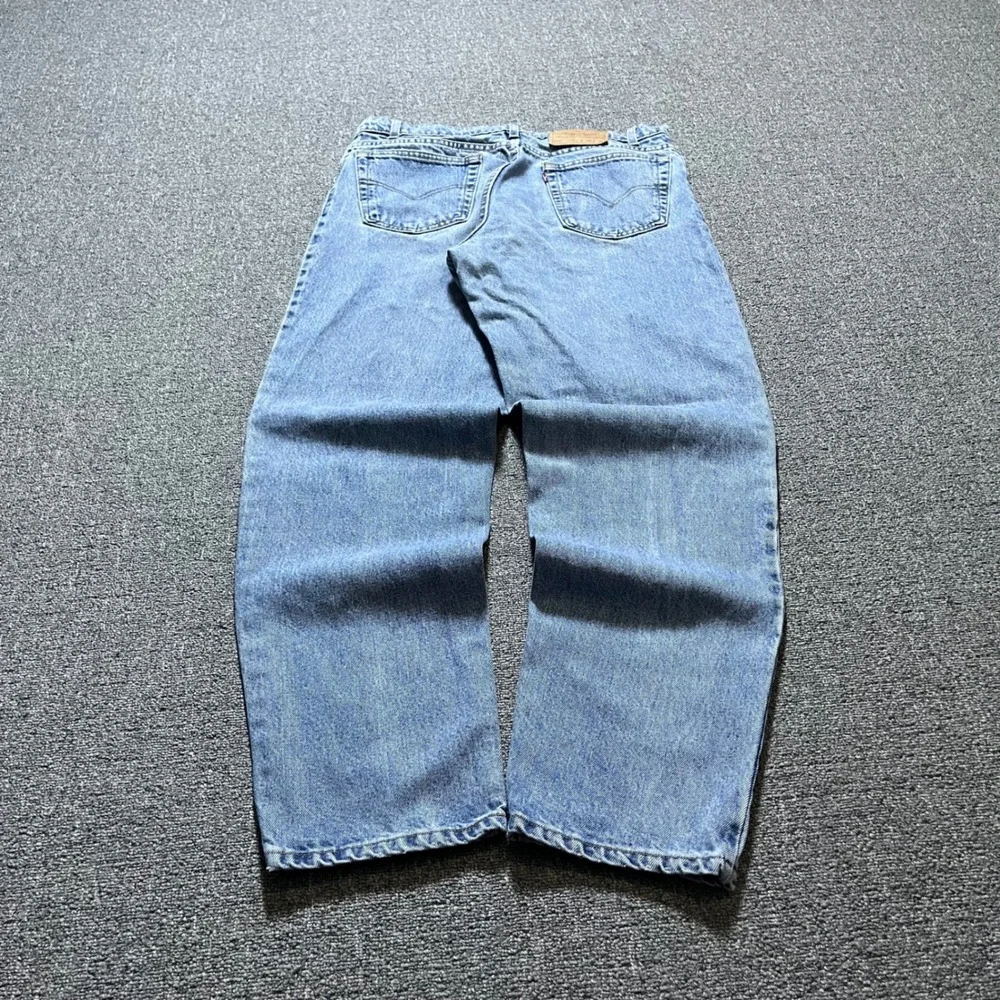 Vintage Levis 550 Relaxed Fit Tapered Leg Jeans 36x32 Blue Light Wash 90s USA